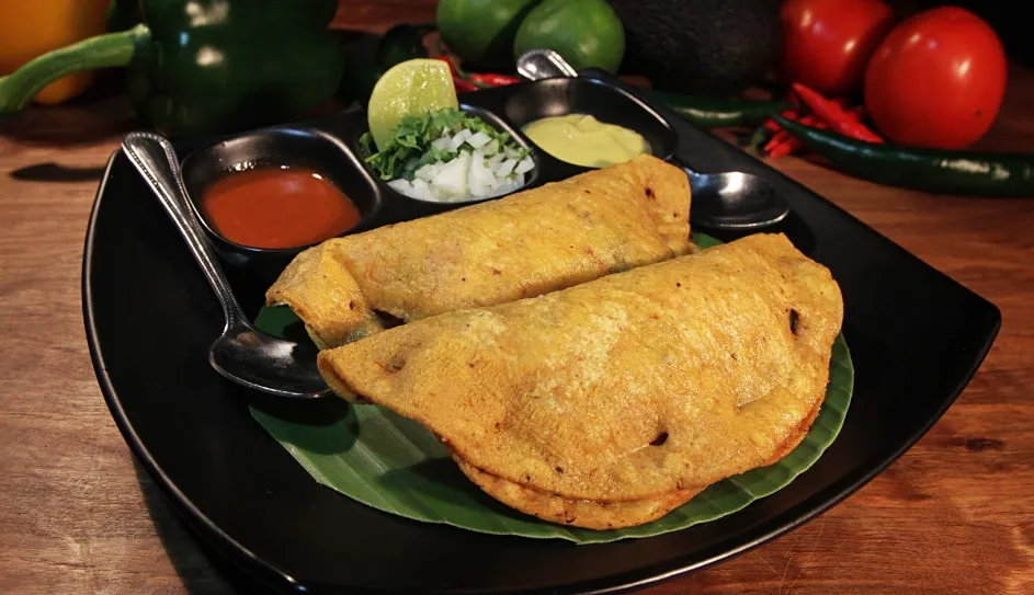 Two crispy seabass pescadillas with salsas