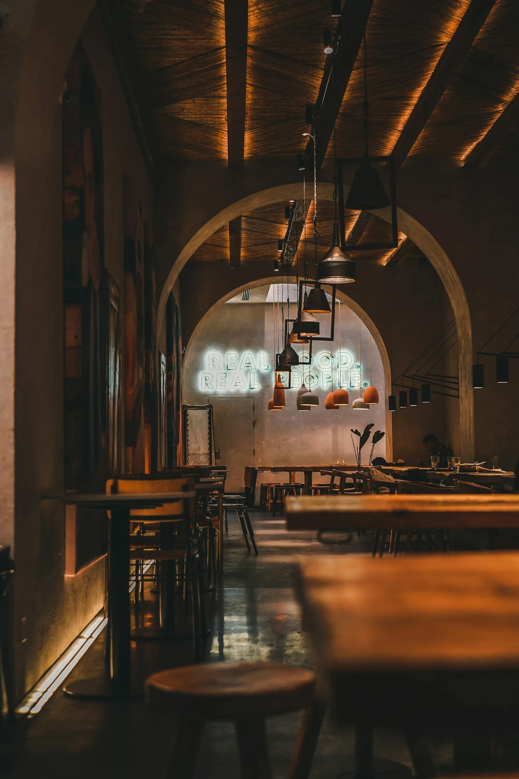 Placeholder photo: a warmly lit restaurant dining room