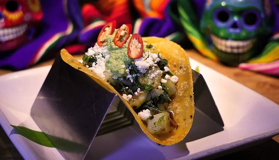 A vegetarian taco in a taco stand